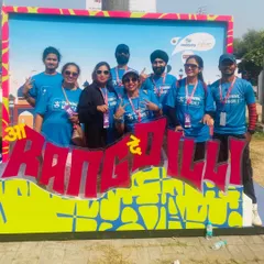 Our volunteer team taking a moment for a photo at a race event in Delhi. We work hard, but we also make sure to celebrate our teamwork and the fun of volunteering together.