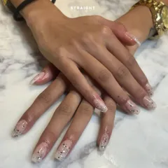 A look at a client's beautiful, long extensions with a subtle speckled design. Happiness is a fresh set of nails.