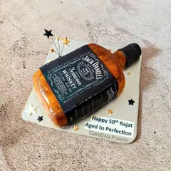 Aged to perfection, just like the celebration! This Jack Daniel's bottle cake is carved and detailed to look just like the real thing, making it the perfect surprise for a milestone 50th birthday. I can replicate any of your favorite bottles into a delicious cake.
