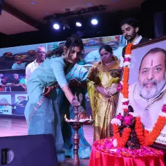 The traditional lamp lighting ceremony to inaugurate the Dhwani Kala Mahotsav. This ritual symbolizes the dispelling of darkness and the beginning of a joyous celebration of art and culture.
