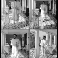 A black and white collage of the groom in his white sherwani, captured in various moments as he walks through a sunlit palace corridor.