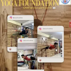 Level up your plank game. Here you see students performing an advanced suspended plank using the yoga wall. This is the ultimate test of core strength and endurance.