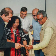 A moment from our firm's book launch, where colleagues and friends share in the celebration. This event marked a special milestone, reflecting on the 2.9 million square feet of projects we have built together.