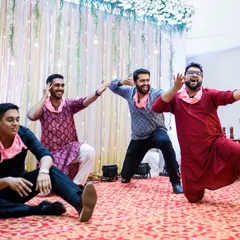 The groom's friends putting on a show at the sangeet. Their coordinated, funny dance moves brought so much energy and laughter to the evening.
