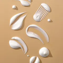 This macro texture shot for Taupe skincare displays the product's creamy consistency. By creating artistic swirls and using a comb to add fine lines, we highlight the luxurious feel of the cream, an important sensory detail for beauty customers.