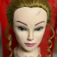 An example of a basic practice drill, creating simple face-framing curls. Mastering these small details is a key part of the learning process in my hair education program.