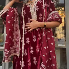 A close up of the beautiful embroidery on my maroon velvet kurta set. The detail and craftsmanship are what make these pieces so special.