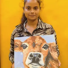 In our knife painting challenge, students were assigned a random animal. This student beautifully captured the gentle expression of a cow using expressive, textured strokes.