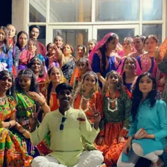Another moment with the folk dance team, capturing the energy and camaraderie before a performance.
