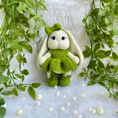 Look at this adorable bunny with her long, floppy ears and sweet green dress! I love when customers have unique ideas, and this long-eared bunny was a joy to bring to life. She is so soft and posable.