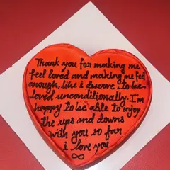A "letter cake" where your personal, heartfelt message is written directly onto a heart-shaped cake. It's a deeply personal and romantic gesture.