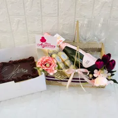 A full view of the anniversary gift set, including a decadent chocolate opera cake, making the celebration even sweeter.