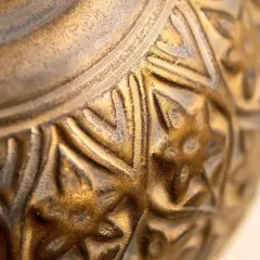 The texture and detail captured with our Medieval Gold glaze. It's a satin matte finish that provides a metallic, antique look, perfect for decorative ceramic art.