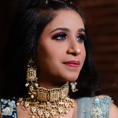 Another detailed shot of the party makeup, showing how it looks from a different angle. The focus is on the eyes, with a complementary lip color.