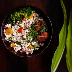 A close-up of my special keema meal, made with finely minced chicken, vibrant vegetables like bell peppers and peas, and topped with fresh dill. This is one of my most popular dishes, loved for its texture and flavor.