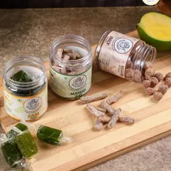 For those who like a bit of a kick, here is our Green Aam Papad, Dried Mango Slices, and Imly Candy. This combination is a perfect mix of tangy, spicy, and sour flavors.