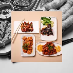 A glimpse of a party menu I recently catered. This spread features a variety of plated dishes like Butter Garlic Prawns, Gochujang Lamb Chops, and Orange Chicken.