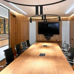 One of the modern conference rooms in our new Bengaluru office, designed to foster teamwork and innovation. We believe in providing the best infrastructure to support our clients' needs.