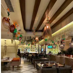 Another angle of the Republic Day decor, showing how hanging decorations and themed cutouts can transform a large dining area for a corporate event or public celebration.