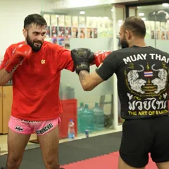 Our sparring sessions are focused on technique and control. Here, two students practice their boxing combinations, learning to read an opponent and react with precision under the guidance of our coaches.