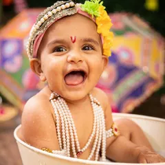 Look at that pure, unfiltered joy! My themed festival sessions, like this Janmashtami shoot, are all about creating a vibrant, playful space for your little ones to shine.