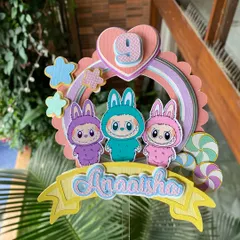 We hopped on the Labubu trend with this adorable handmade topper. The cute monster characters and pastel colors make it a fun and unique choice for a 9th birthday.