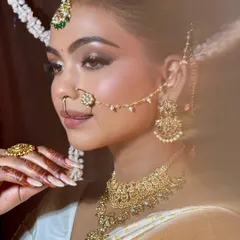 Another shot of my modern South Indian bride, showcasing the intricate jewelry and the way the makeup complements the entire look.