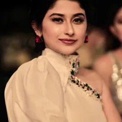 A stunning portrait from a fashion event, highlighting the model's elegant attire and makeup. My photography is perfect for capturing the glamour of fashion shows and award nights.