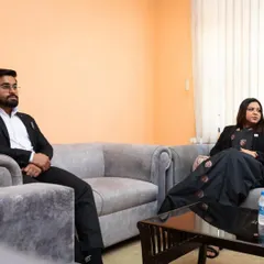 In a discussion with a fellow advocate during a moot court competition at B.S. Anangpuria College of Law. The students were well-prepared and presented their cases impressively.