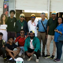 A group photo with drivers, parents, and team members. The support system off the track is just as important as the work done on it, and we are grateful for our entire community.