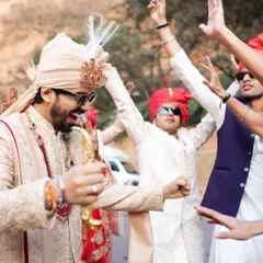 The groom and his squad, full of energy and ready to dance their way to the wedding. The baraat is a celebration in itself, and I make sure it's an unforgettable party.