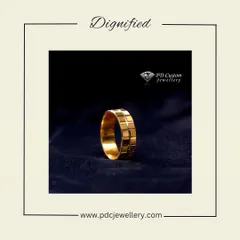 A dignified and solid 22kt hallmark gold band for men. The simple yet strong design with a textured pattern makes it a timeless and classic choice.