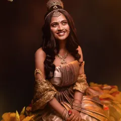 Another portrayal of Shailaputri, seated among flowers to represent her connection to nature and groundedness. This look reminds us to stand tall in our values and never compromise our worth.