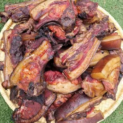 A platter of our traditionally smoked pork, fresh from Nagaland. You can see the rich color and texture that comes from being slowly smoked over a wood fire, a preservation method passed down through generations.