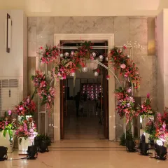 Your Mehendi should be a party. I designed this "Retro Disco" themed entrance with vibrant floral arrangements and sparkling disco balls to set a fun, high-energy tone from the moment guests arrived.