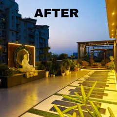 An after shot of a terrace turned into a cozy haven. The design includes a beautiful Buddha water feature with backlighting, creating a peaceful focal point for the entire space.