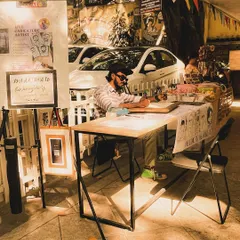 A wider view of my pop-up stall on a sunny day. My setup is mobile and can fit into any event space, indoors or outdoors.