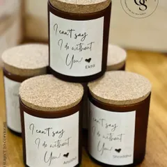 "I can't say I do without you!" These personalized scented candles are a warm and heartfelt way to ask your closest friends to be by your side. Each candle features a custom label with their name.