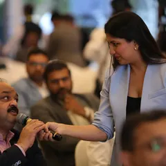 Engaging directly with the audience is key to a successful event. Here I am during a Q&A session at the 'Voice of Cipla' event, ensuring every voice is heard.