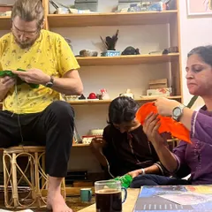 Parents completely absorbed in their embroidery work. These gatherings are a chance to slow down, focus our hands, and connect with one another in a calm and creative atmosphere.