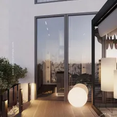 This balcony is transformed into a magical evening retreat with a variety of our outdoor lights. The glowing floor sphere and pathway lights demonstrate how layering different fixtures can create a cozy and well-defined outdoor space.