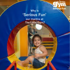 Why is 'Serious Fun' my mantra? Because it's where joy meets growth. This happy child peering through a tunnel is not just playing; she's developing spatial awareness and confidence.
