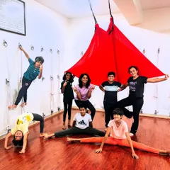 My kids' aerial yoga batches are all about playful exploration. It's a space for them to swing, stretch, giggle, and build confidence. Look at these happy faces and strong poses.