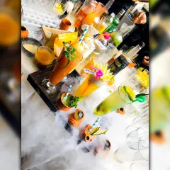 I love creating drinks that are a feast for the eyes and the palate. This is a glimpse of my signature smokey cocktails, using dry ice to create a dramatic, theatrical effect that wows guests as they receive their drinks.