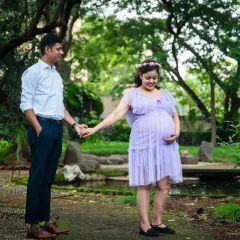 This couple's connection is so sweet. I captured them holding hands in a beautiful park, with the mom-to-be glowing in a lovely lavender dress.