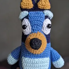 My crochet version of Bluey, the beloved cartoon dog. I used different shades of blue yarn to capture her distinct markings.