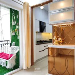 This unique view shows a custom bar unit that acts as a transition between the kitchen and a cozy balcony. It's a perfect example of how we create functional and enjoyable spaces that extend beyond the kitchen itself.