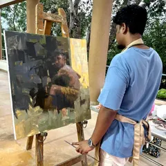 Here I am with the finished painting "HOPE II" at a monsoon art camp in Lonavla. The piece, showing a young boy with his pigeons, is a meditation on childhood, nature, and hope.