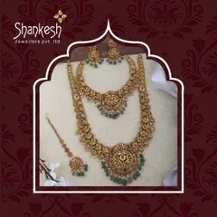 This complete bridal ensemble, featuring a matching choker, long necklace (haar), and maang tikka, is an example of the comprehensive, ready-to-sell sets available in our inventory.