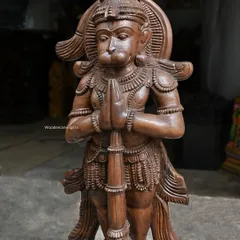 A 38-inch sculpture of Lord Hanuman in a 'Namaste' pose, holding his Gada (mace). This statue embodies devotion and strength, making it a powerful guardian for any home.